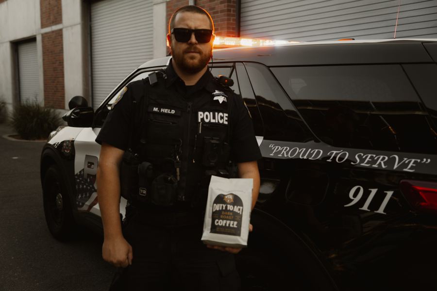 Officer at a cruiser